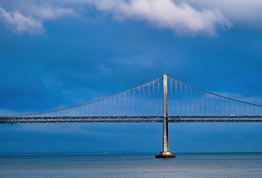 Sunlight on Bay Bridge Through Storm Clouds