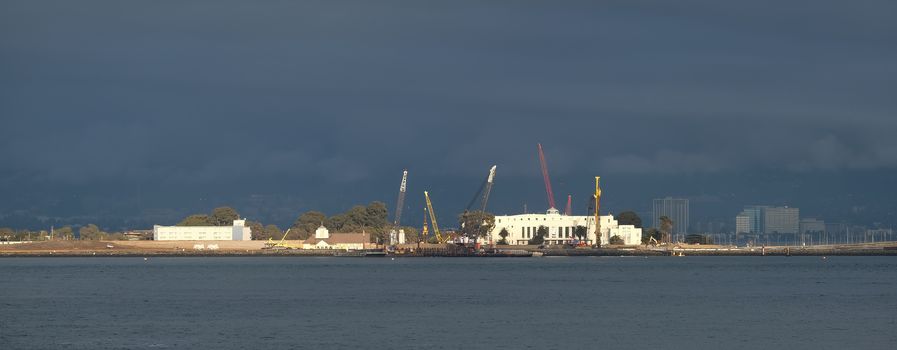 Construction Cranes on Stormy Coast of San Francisco