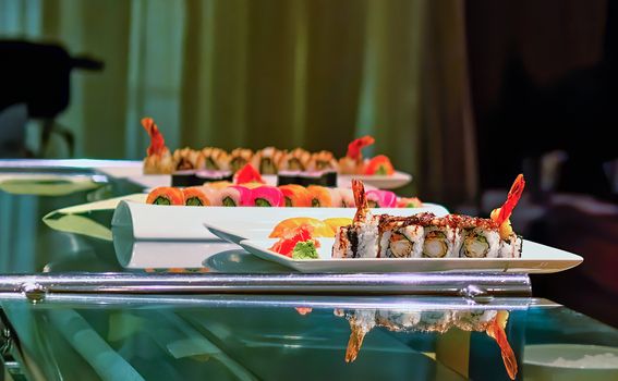 Sushi Rolls on Counter of a Japanese Restaurant.