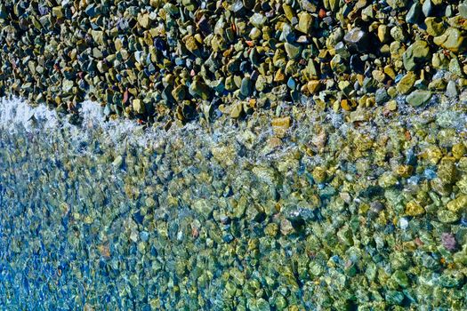 Calm Surf on Colorful Rocky Shore