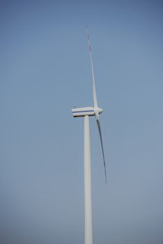 wind trubine at sunny day with blue sky