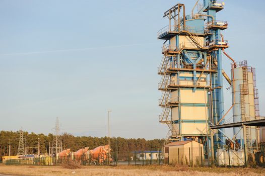 Modern industrial exterior building over blue sky