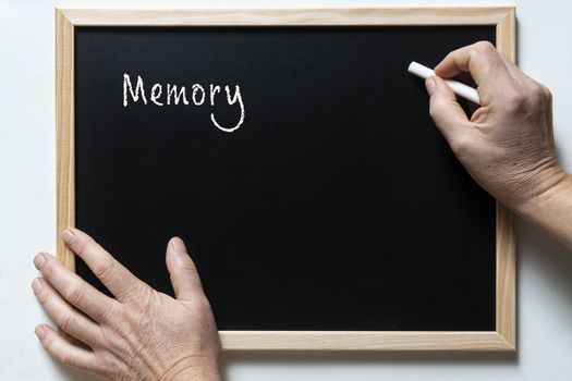 a blackboard with written the word memory