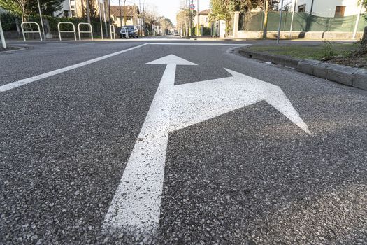 the directions painted on the road surface