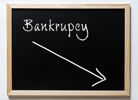 a blackboard with written the word Bankrupty