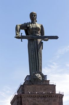Yerevan,Armenia - April 22, 2015:Tourist's visiting main Yerevan landmark - Mother Armenia Statue or Mayr hayastan. Monument located in Victory Park, Yerevan city, Armenia.