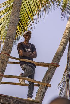 PLAYA LIMON, DOMINICAN REPUBLIC 28 DECEMBER 2019: Dominican man looks at the sea