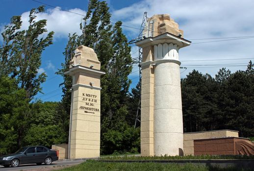 PYATIGORSK,RUSSIA - MAY 21,2010:Pylons at the road to the place of the duel of Lermontov,symbolizing the tragic death of the poet.Installed by the architect Svetlitsky in 1951.On the left column there is an inscription"To the place of the duel of Lermontov"