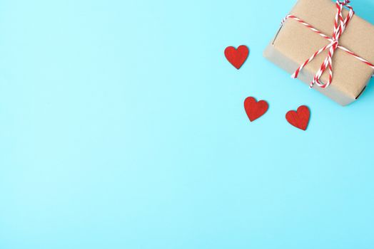 Valentine's Day Concept, Top view Flat lay, gift box and red heart on blue background with copy space for your text