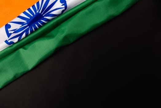 Indian republic day, flat lay top view, Indian flag on black background with copy space for your text