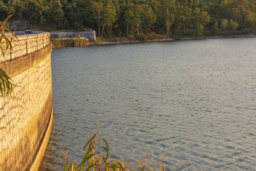 Lake Marathon and dam on a autumn evening, Attica, Greece.