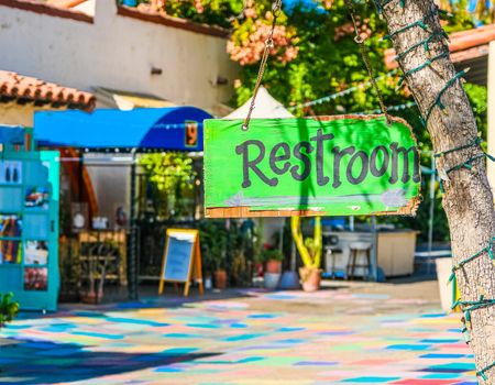 Green Restroom Sign in Balboa Park Artist Market