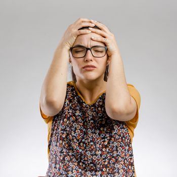 Portrait of a woman  with headache