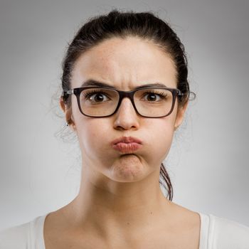 Cute portrait of a woman with a mad expression