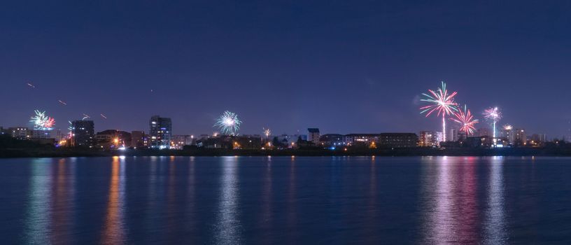 2020 New Year colorful fireworks exploding on the sky above Lacul Morii Lake, Bucharest, Romania - 1/1/2020.