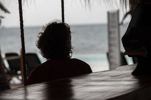 Shadow of person looking at the sea in Dominican Republic