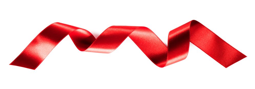 Curled spiral red ribbon tape isolated on white background