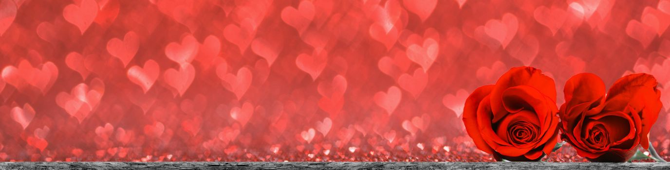 Hearts of red roses on red heart bokeh background Valentines day design