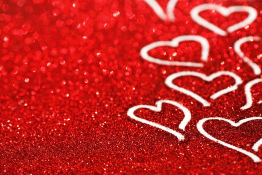 Happy Valentine's day card with hearts on glitter background