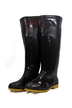 Brown waterproof rubber boots isolated on white background.(with Clipping Path).