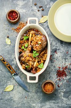 Appetizing roasted duck leg.Holiday duck legs baked in apple