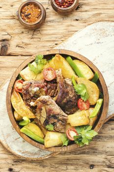 Roasted meat.Plate of grilled meat and potatoes