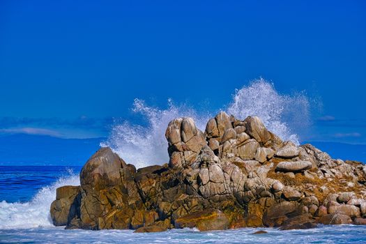 Surf Crashing Against Blue Sky in Pacific Grove