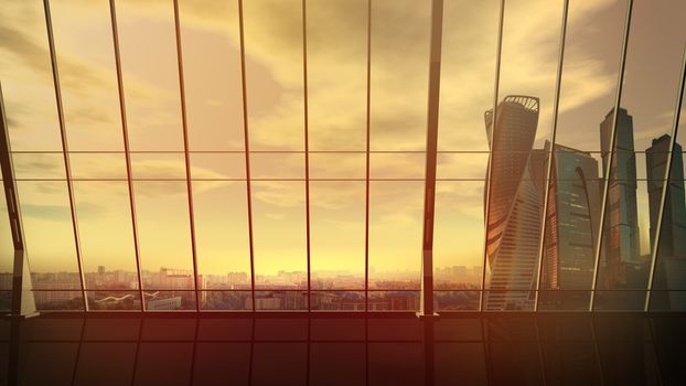 Panoramic view of the cityscape with skyscrapers at sunset from the window of an empty office.