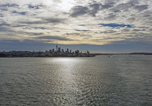 The skyline of Auckland, New Zealand, rising beyond the Westhaven Marina.