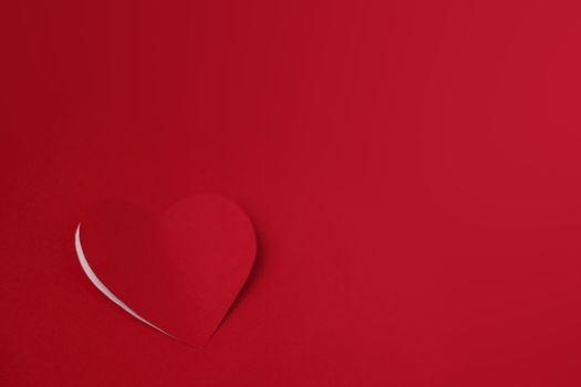 Heart cut from red paper background, Valentines day card