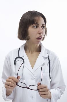 Young female doctor on white isolated background