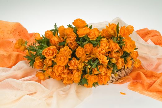 Still life with bouquet of flowers and accessories on a studio background