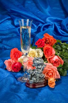 Still life with bouquet of flowers and accessories on a studio background