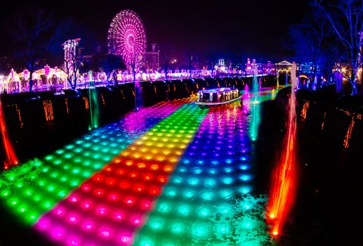 NAGASAKI, JAPAN - April 29,2019 : Huis Ten Bosch is a theme park in Nagasaki, Japan, which displaying old Dutch buildings and colorful lights show at night.