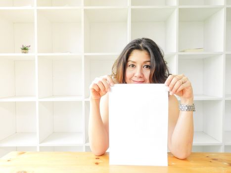 Beautiful woman smiling happy against white background.
