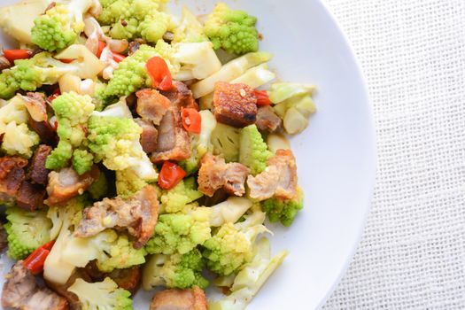 Stir fry Romanesco broccoli with crispy pork and chili, very healthy and delicious