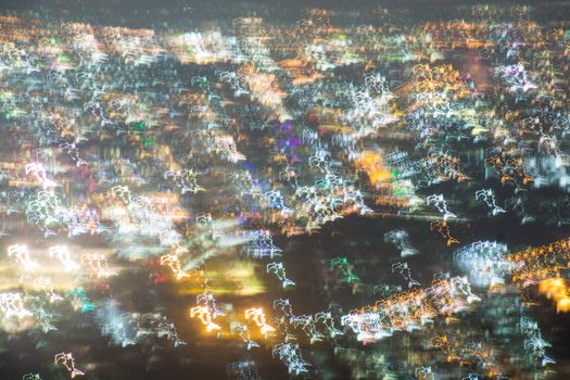 Abstract long exposure, experimental surreal photo, city and vehicle lights at night
