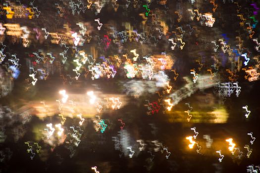 Abstract long exposure, experimental surreal photo, city and vehicle lights at night
