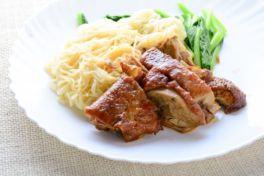 Roast duck with egg noodle
