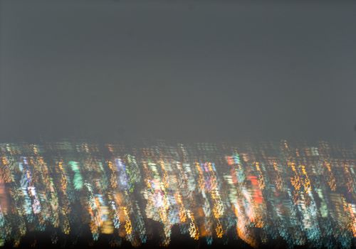 Abstract long exposure, experimental surreal photo, city and vehicle lights at night
