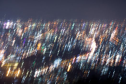 Abstract long exposure, experimental surreal photo, city and vehicle lights at night
