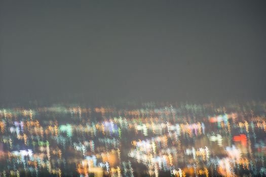 Abstract long exposure, experimental surreal photo, city and vehicle lights at night
