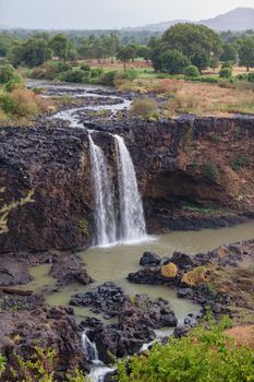 Blue Nile waterfall in dry season with low water flow near Bahir Dar and Lake Tana. Rainy weather. Nature and travel destination. Amhara Region Ethiopia, Africa wilderness