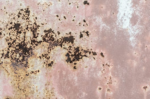 background texture pattern of old rusty iron wall with orange paint close up