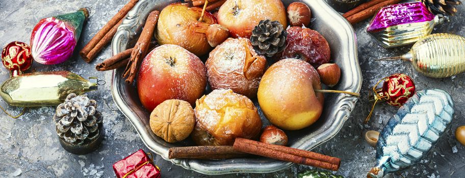 Fruit dessert baked red apples.Christmas food and xmas decoration