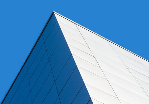 fragment corner of a modern building on a blue background isolated