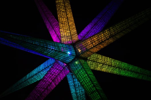 abstract decoration with colored lights in the dark isolated