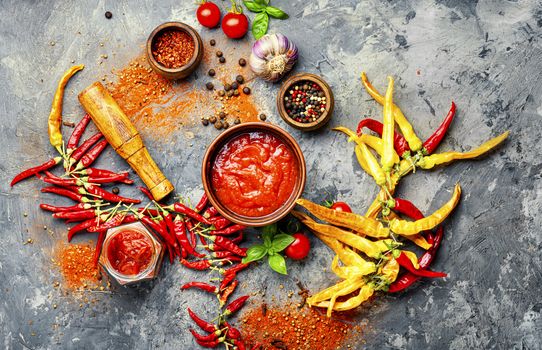 Homemade hot chilli sauce.Red chili peppers and chili sauce