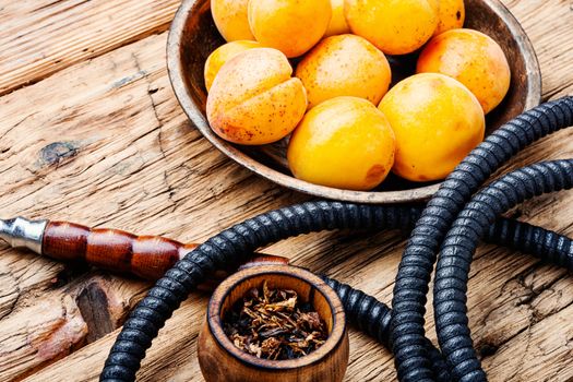 Smoking hookah.Details of Turkish kalian.Shisha with a fruity aroma of tobacco.