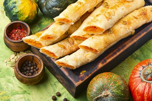 Moldovan pie made of yeast puff pastry.Pie with pumpkin.Placinta